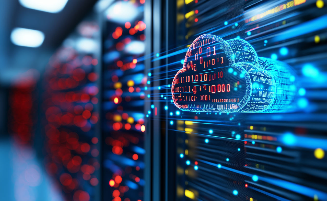 cloud computing concept overlaid on server racks with moving data flow | DXC Technology