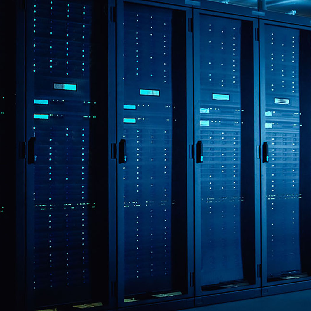 Rack of blue metal cloud servers in operational data center, Managed Services for Google Cloud | DXC Technology