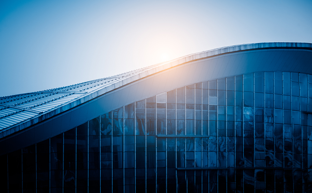 building with curved roof, Salesforce | DXC Technology