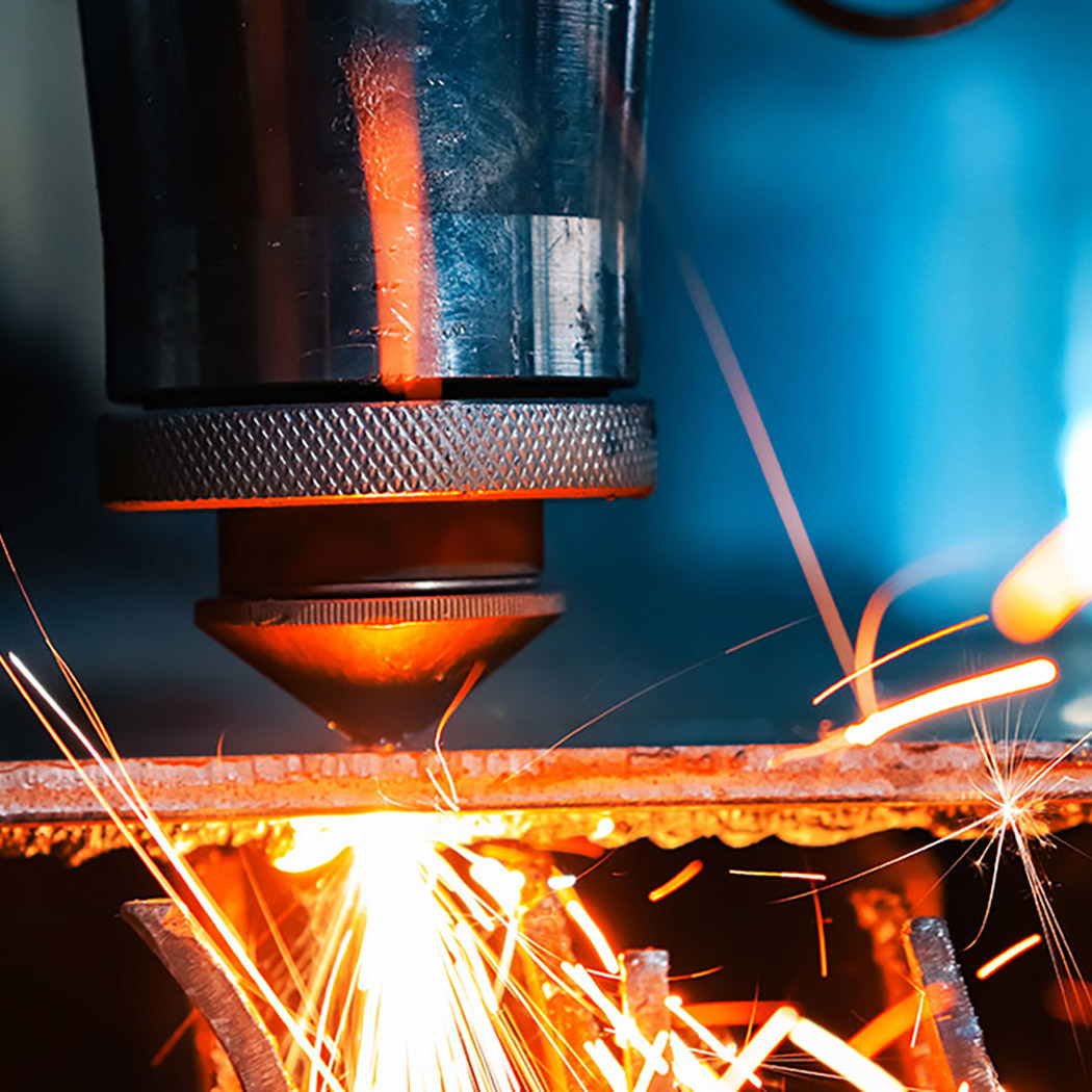 Laser cutting of a thick sheet of metal in production, AWS | DXC Technology