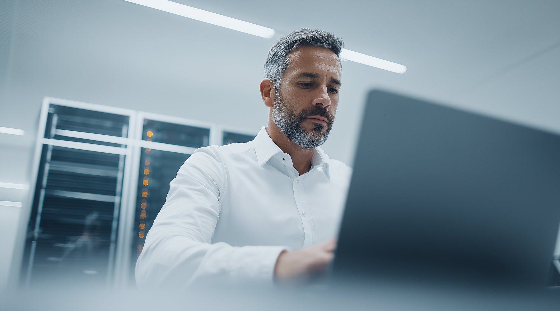 man working in a data center, Private AI for the Enterprise | DXC Technology