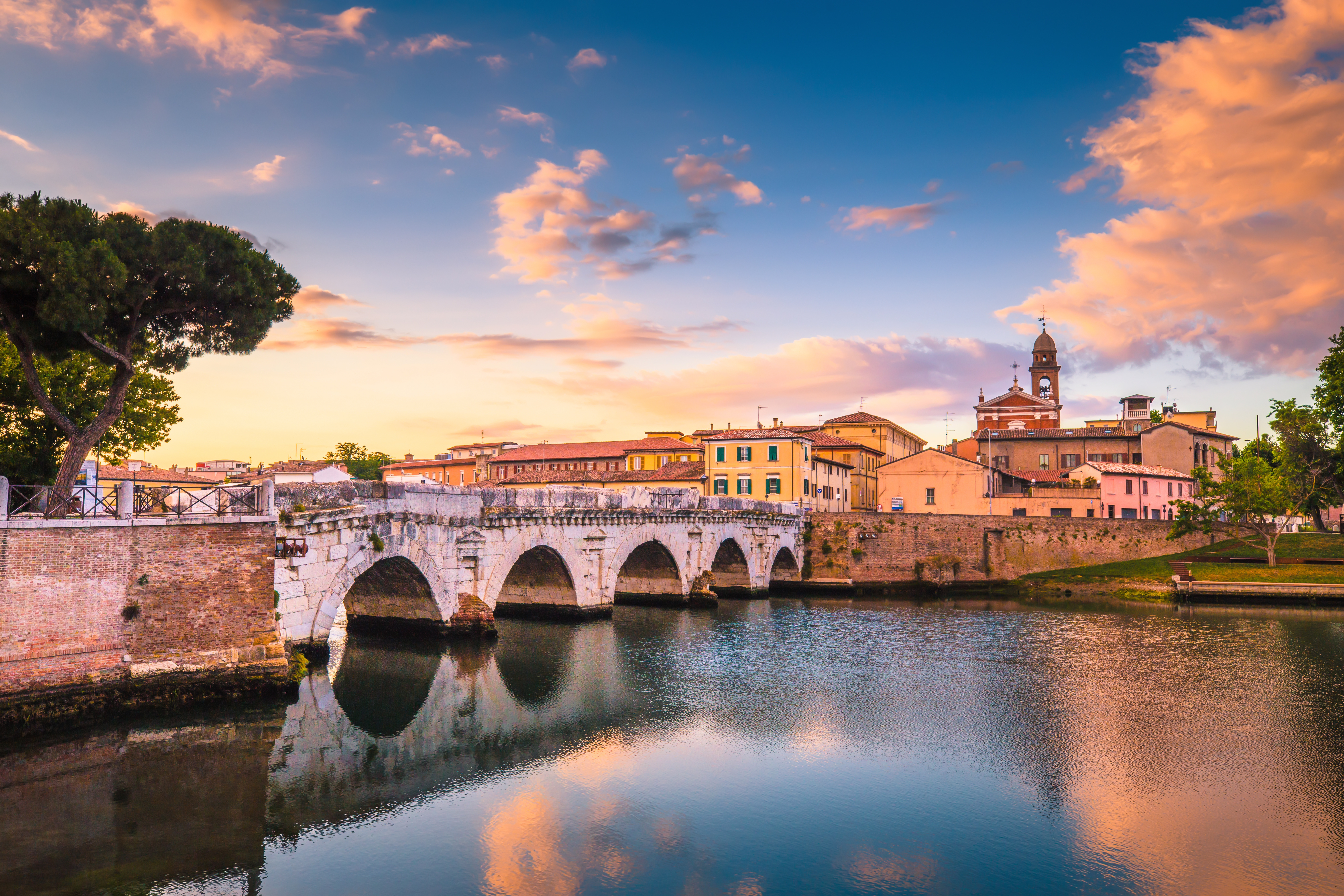 View of bridge over river and Rimini, Italy in early morning, Ecomondo 2026 | DXC Technology Events