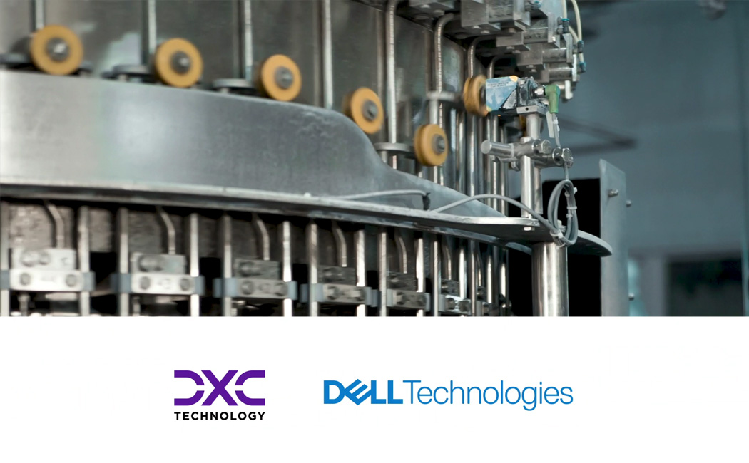 machinery at work in a factory, Dell Technologies | DXC Technology