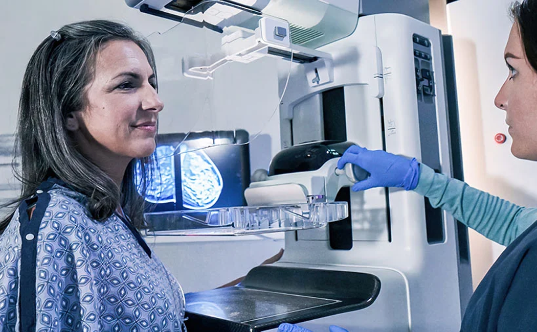 Woman preparing for mammogram - AI Solutions in Healthcare | DXC Technology Insights