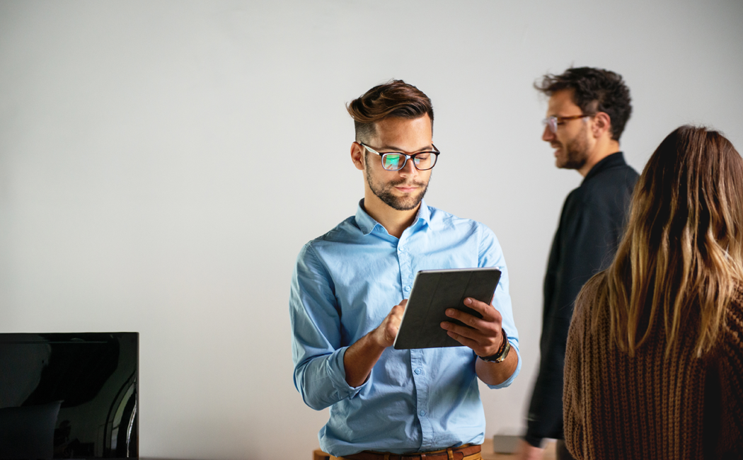 Hands typing on laptop keyboard - Managing Debt in the Insurance Industry | DXC Technology Insights