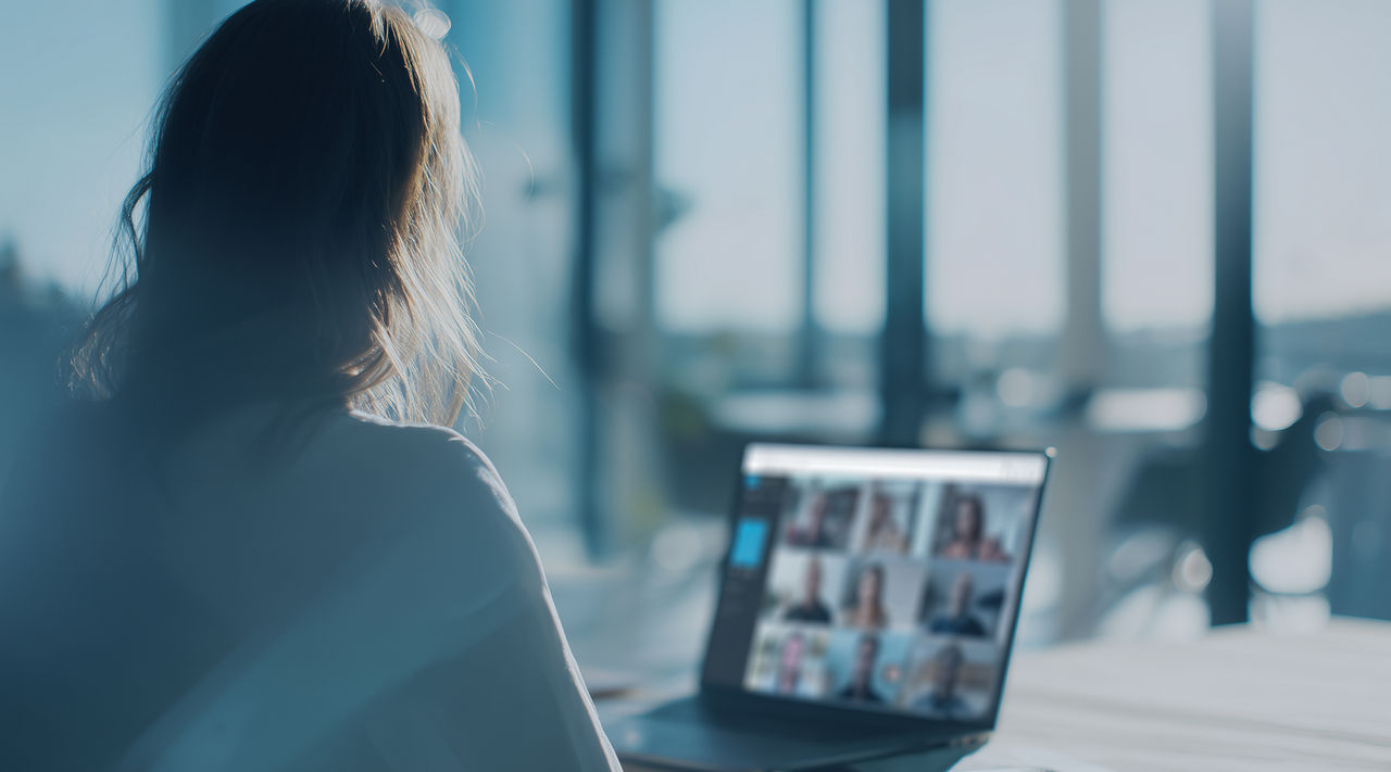 collaborating with colleagues online, Intelligent Collaboration | DXC Technology